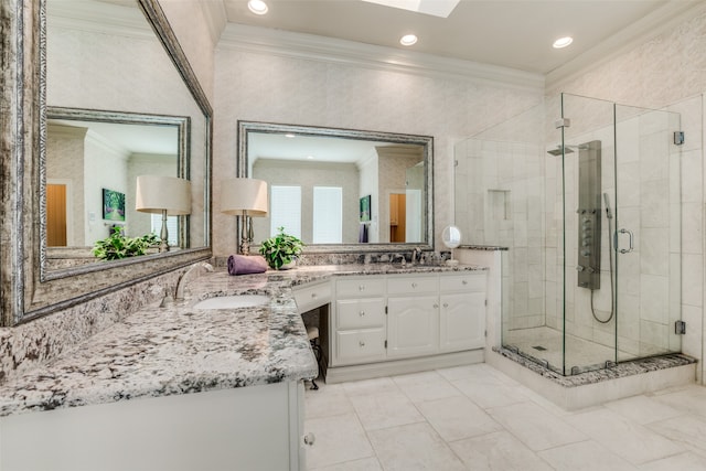 bathroom featuring a skylight, tile patterned flooring, crown molding, vanity, and a shower with shower door