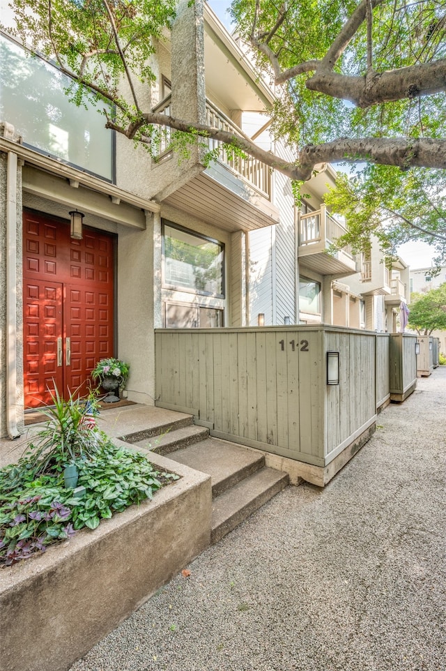 exterior space featuring a balcony