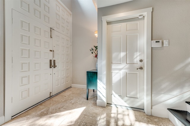 view of tiled entrance foyer