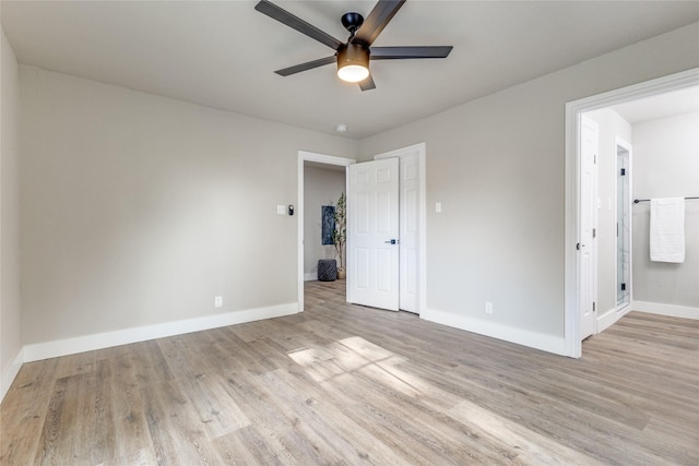 unfurnished room featuring light wood-type flooring and ceiling fan