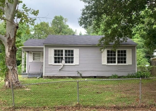 view of property exterior with a lawn