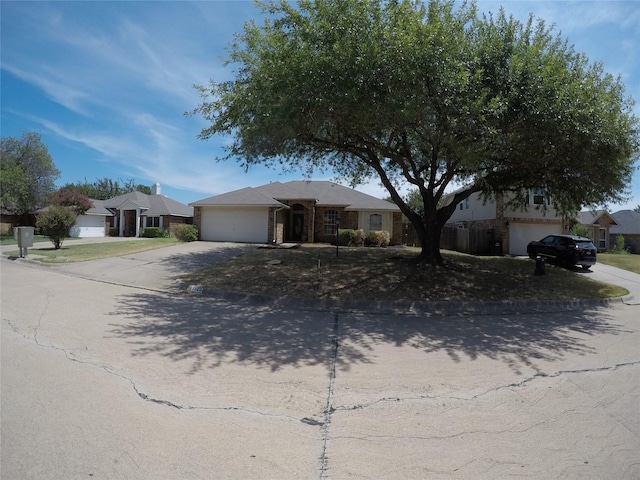 single story home featuring a garage