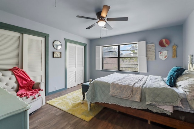 bedroom with hardwood / wood-style flooring and ceiling fan