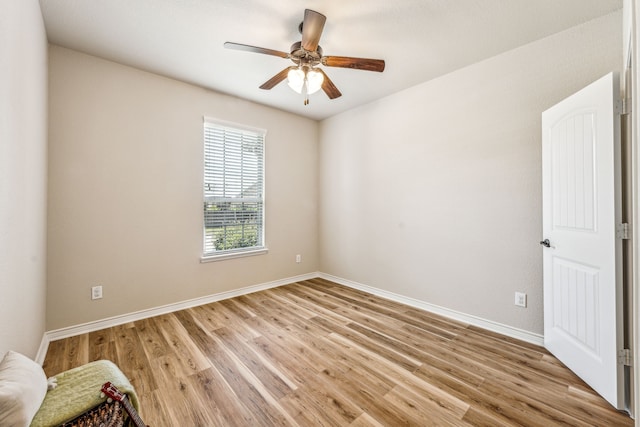 unfurnished room featuring ceiling fan and light hardwood / wood-style floors