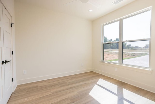 115 Palisades Dr, Gordonville, TX 76245 - unfurnished room with ceiling fan and light wood-type flooring