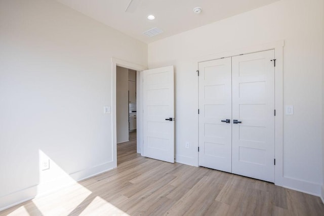 115 Palisades Dr, Gordonville, TX 76245 - unfurnished bedroom featuring a closet and light hardwood / wood-style flooring