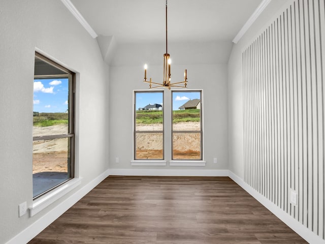 unfurnished dining area with baseboards, dark wood-type flooring, and a healthy amount of sunlight