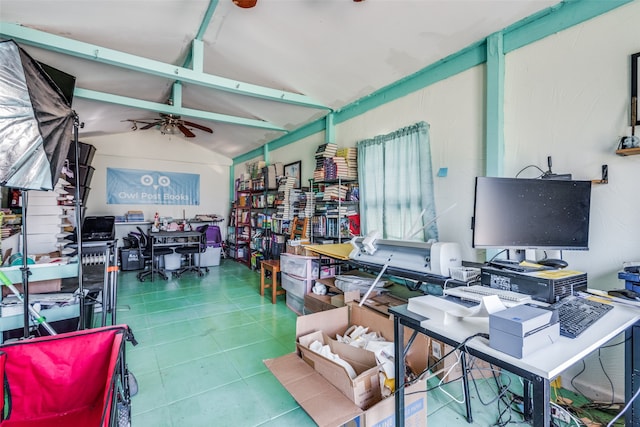 tiled office with vaulted ceiling with beams and ceiling fan