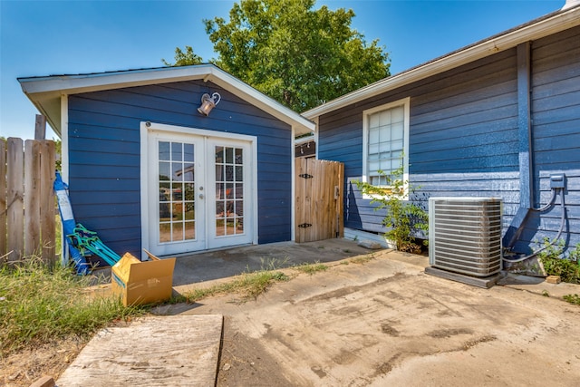 view of outbuilding with central air condition unit