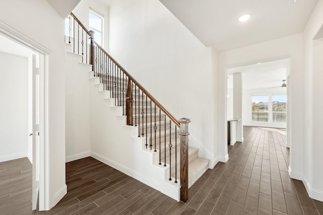 staircase featuring hardwood / wood-style flooring