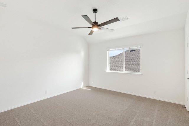 unfurnished room with carpet, lofted ceiling, and ceiling fan