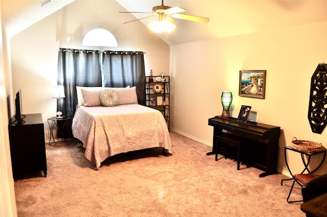 bedroom with carpet flooring, vaulted ceiling, and ceiling fan