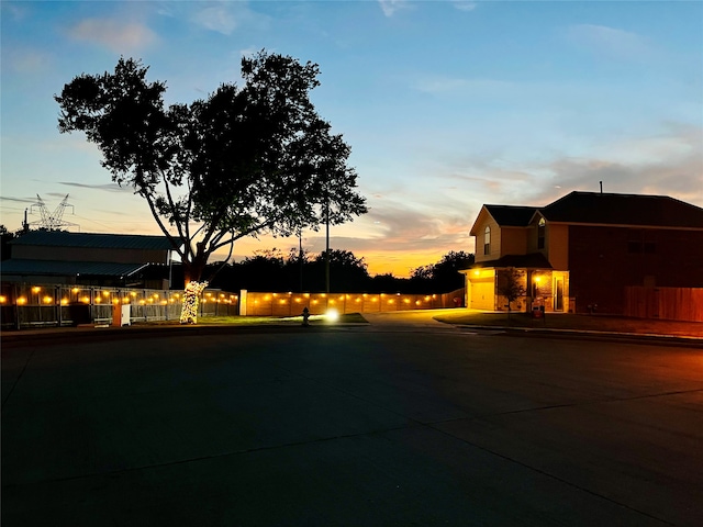 view of yard at dusk