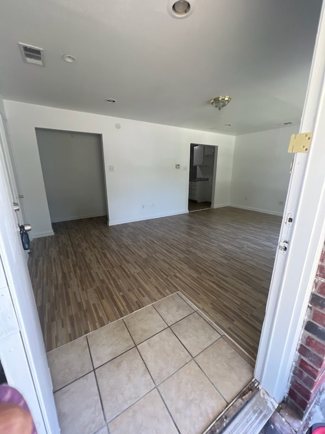 empty room featuring hardwood / wood-style floors