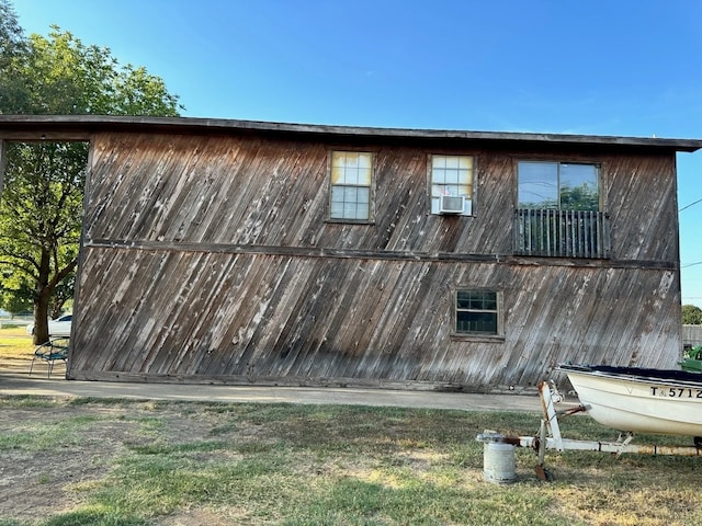 view of home's exterior featuring cooling unit