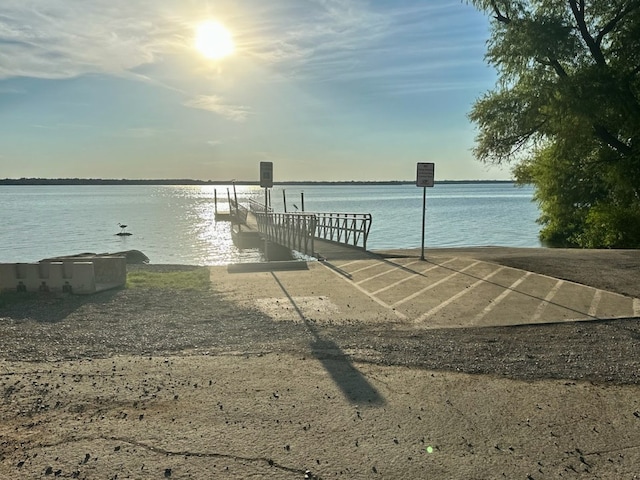 dock area featuring a water view