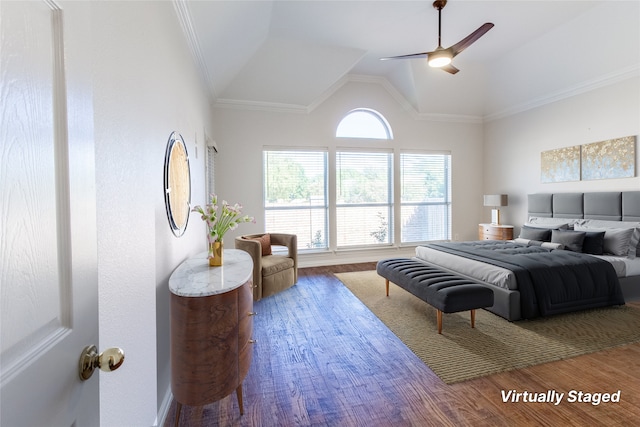 bedroom with ceiling fan, crown molding, lofted ceiling, and hardwood / wood-style flooring