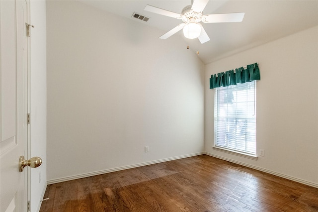 unfurnished room with ceiling fan, wood-type flooring, and vaulted ceiling