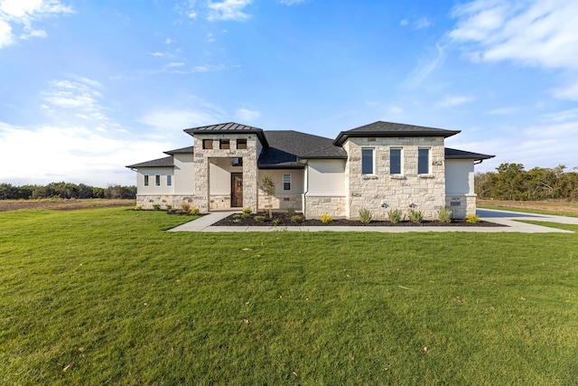 prairie-style home featuring a front yard