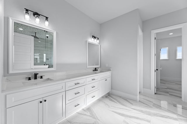 bathroom featuring vanity and a shower with shower door