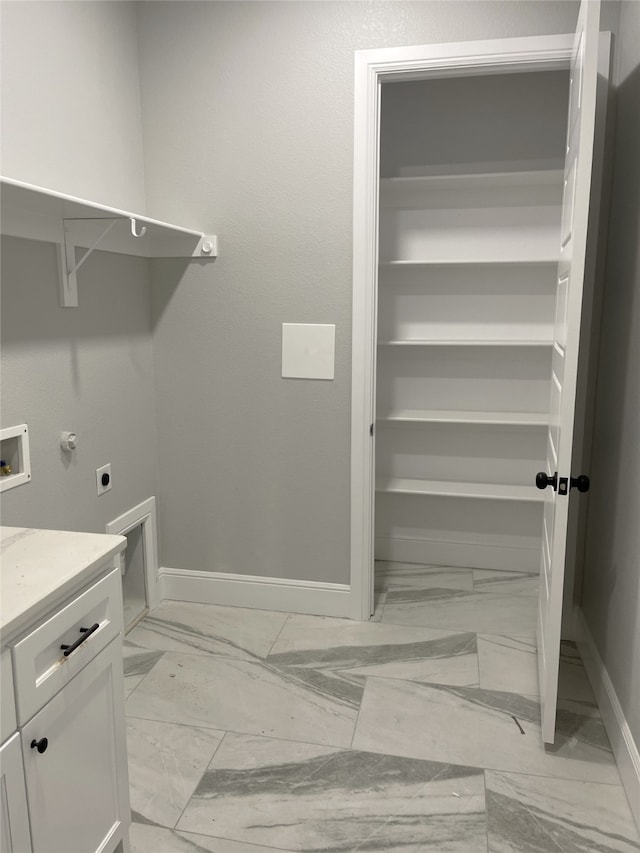 laundry area featuring hookup for a washing machine and electric dryer hookup