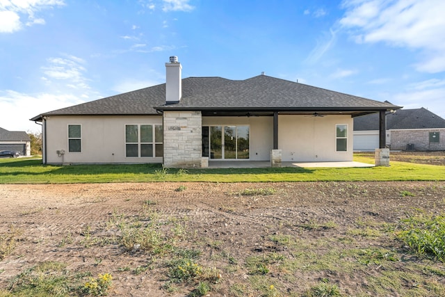 back of house with a patio area, a lawn, and ceiling fan