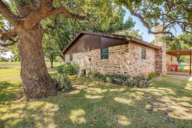 view of property exterior featuring a yard