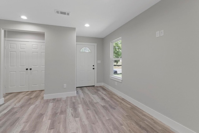 entrance foyer featuring light hardwood / wood-style floors