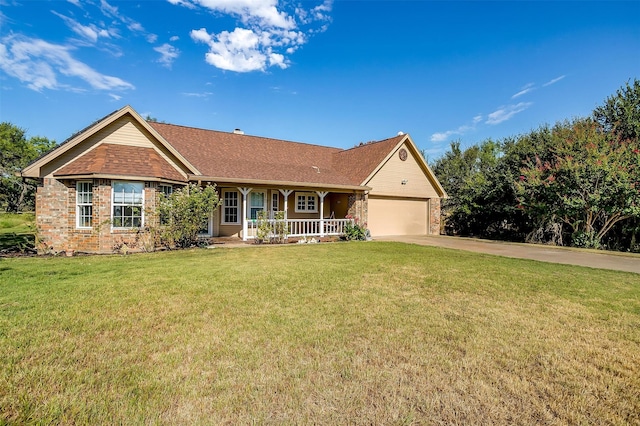 ranch-style house featuring a front lawn, a garage, and a porch