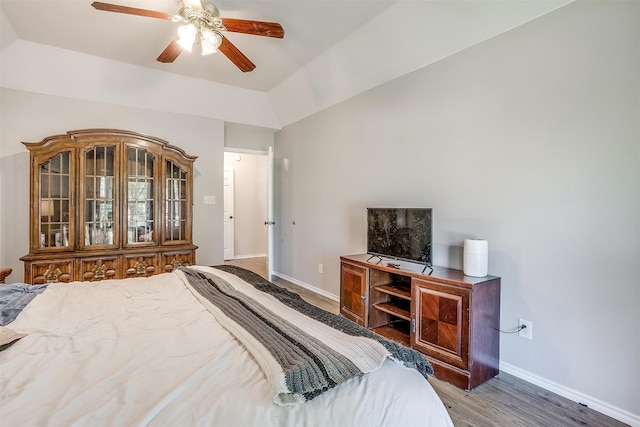 bedroom with ceiling fan and hardwood / wood-style floors