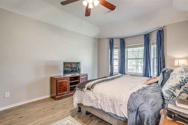 bedroom featuring ceiling fan and light hardwood / wood-style floors