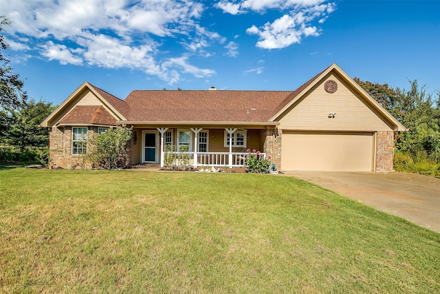 ranch-style house with a front lawn, a garage, and covered porch