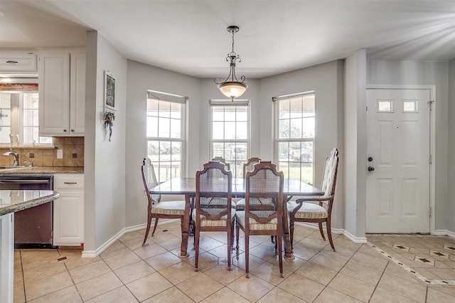 tiled dining area with sink