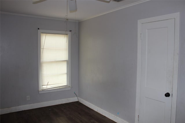 929 Forsythe St, Carthage, TX 75633 - empty room featuring baseboards, a ceiling fan, dark wood-style flooring, and crown molding