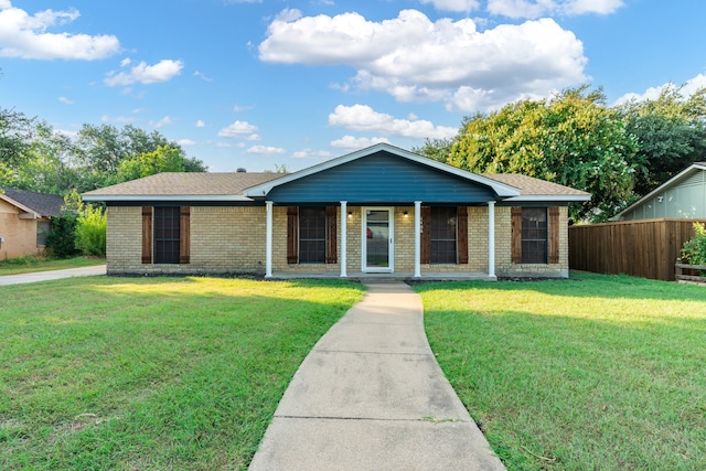 ranch-style house featuring a front lawn