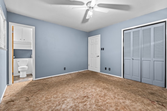 unfurnished bedroom featuring ceiling fan, a closet, connected bathroom, and carpet