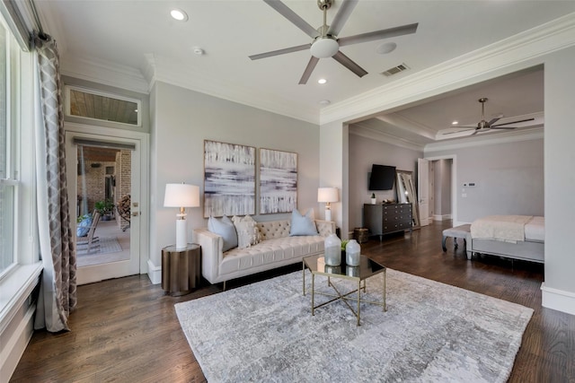 living area featuring visible vents, ornamental molding, wood finished floors, and recessed lighting