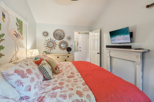 bedroom featuring vaulted ceiling