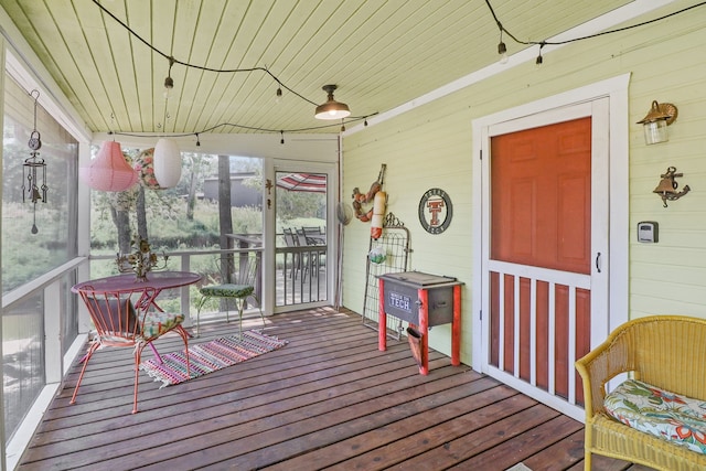 sunroom / solarium with wood ceiling