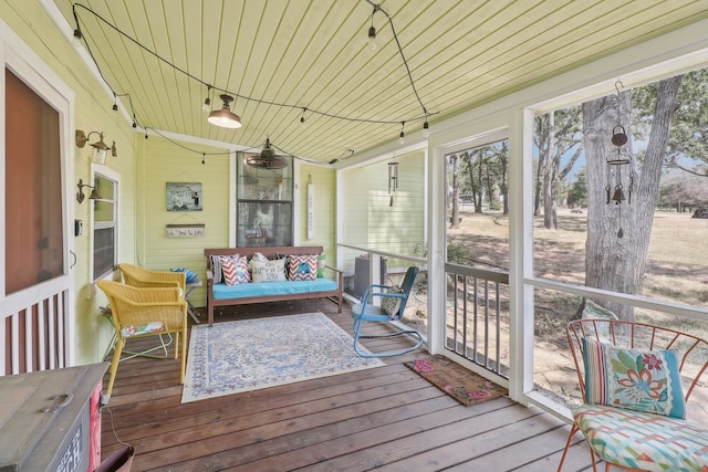 sunroom with wooden ceiling