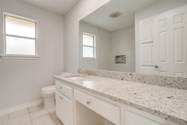 full bathroom featuring baseboards, visible vents, toilet, tile patterned floors, and vanity