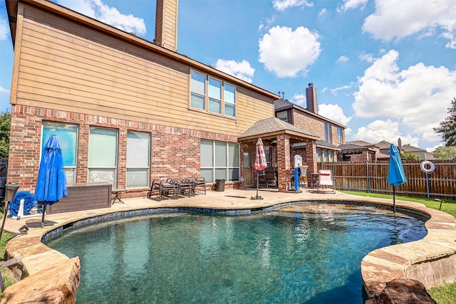 view of pool featuring a patio area