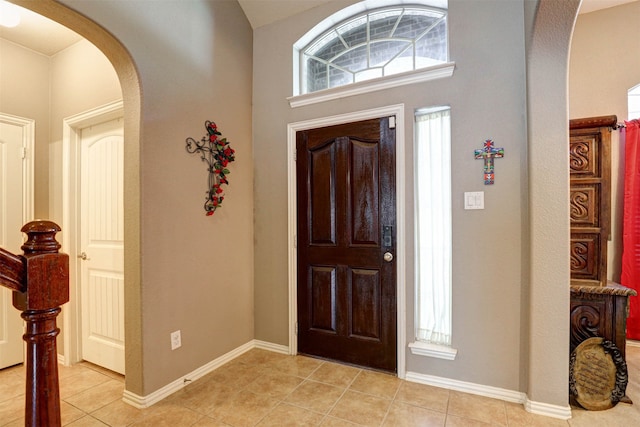 entryway featuring light tile patterned floors