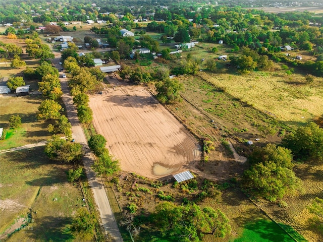 birds eye view of property featuring a rural view