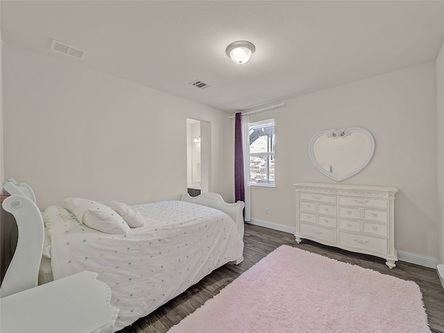 bedroom featuring hardwood / wood-style floors