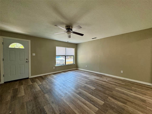 entryway featuring ceiling fan, hardwood / wood-style floors, and a healthy amount of sunlight