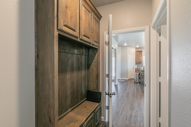 mudroom with dark hardwood / wood-style floors