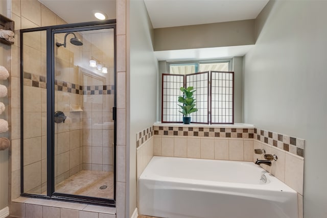 bathroom featuring plus walk in shower