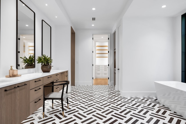 bathroom featuring a bathtub and vanity