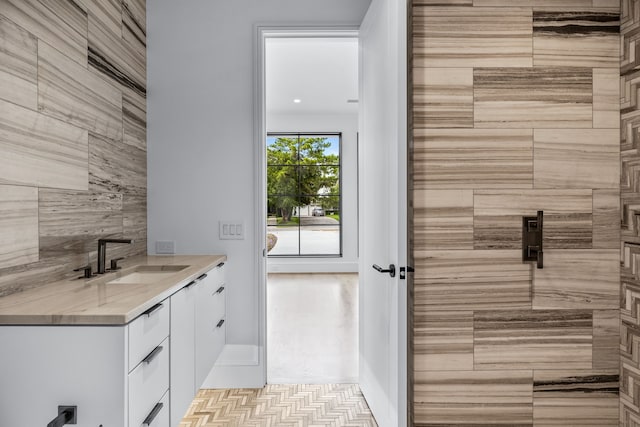 bathroom featuring tile patterned floors and vanity